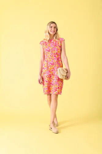 Model wearing Floral Dream Lancaster Dress By Charlie Jane Available at Beetees Nelson
